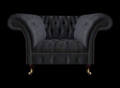 Woonkamer Chesterfield zwarte eenzits textielstoel chique fauteuil.